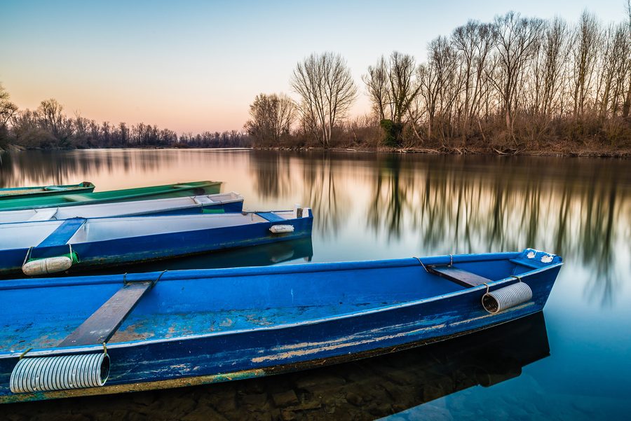 Barche sull’Adda presso Lodi al tramonto