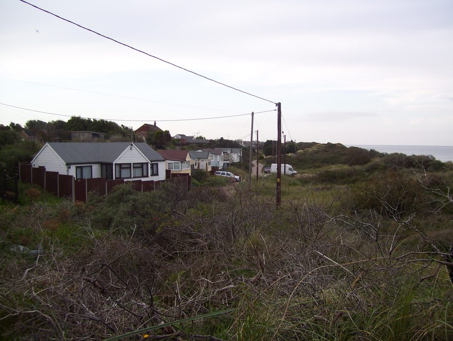 Cabine da spiaggia e dune di sabbia a Hemsby